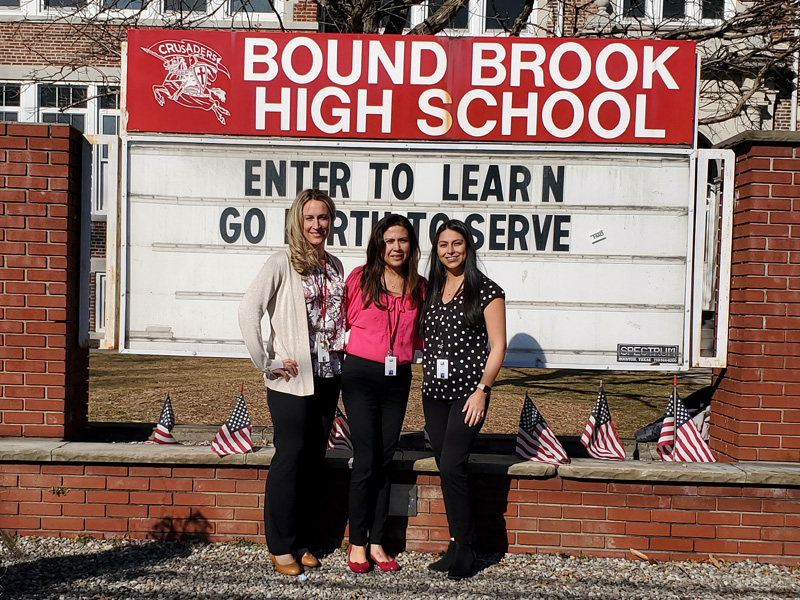 Social workers in front of Bound Brook High School