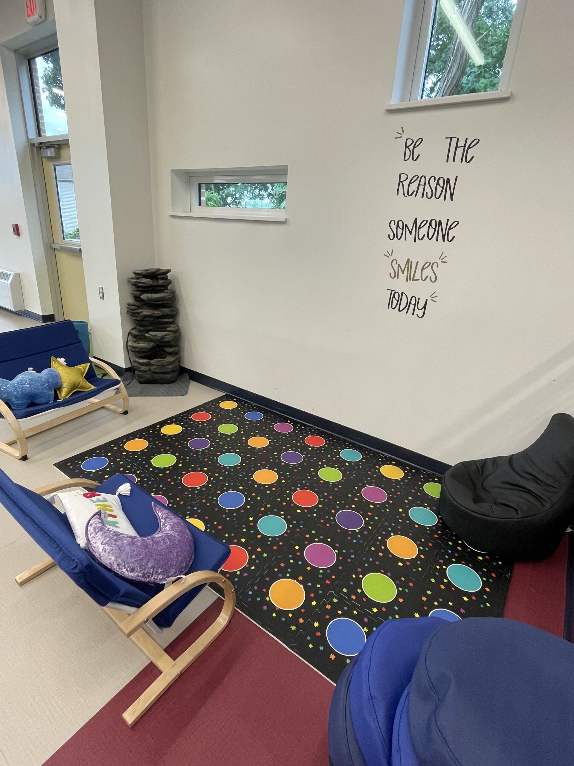 The Chill Zone in the Lafayette cafeteria boasts a colorful rug, relaxing water fountain, and flexible students so students can take a break during lunch when the cafeteria is full.