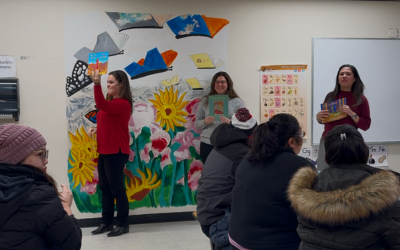 Educators lead the discussion on the books distributed during the February meeting.